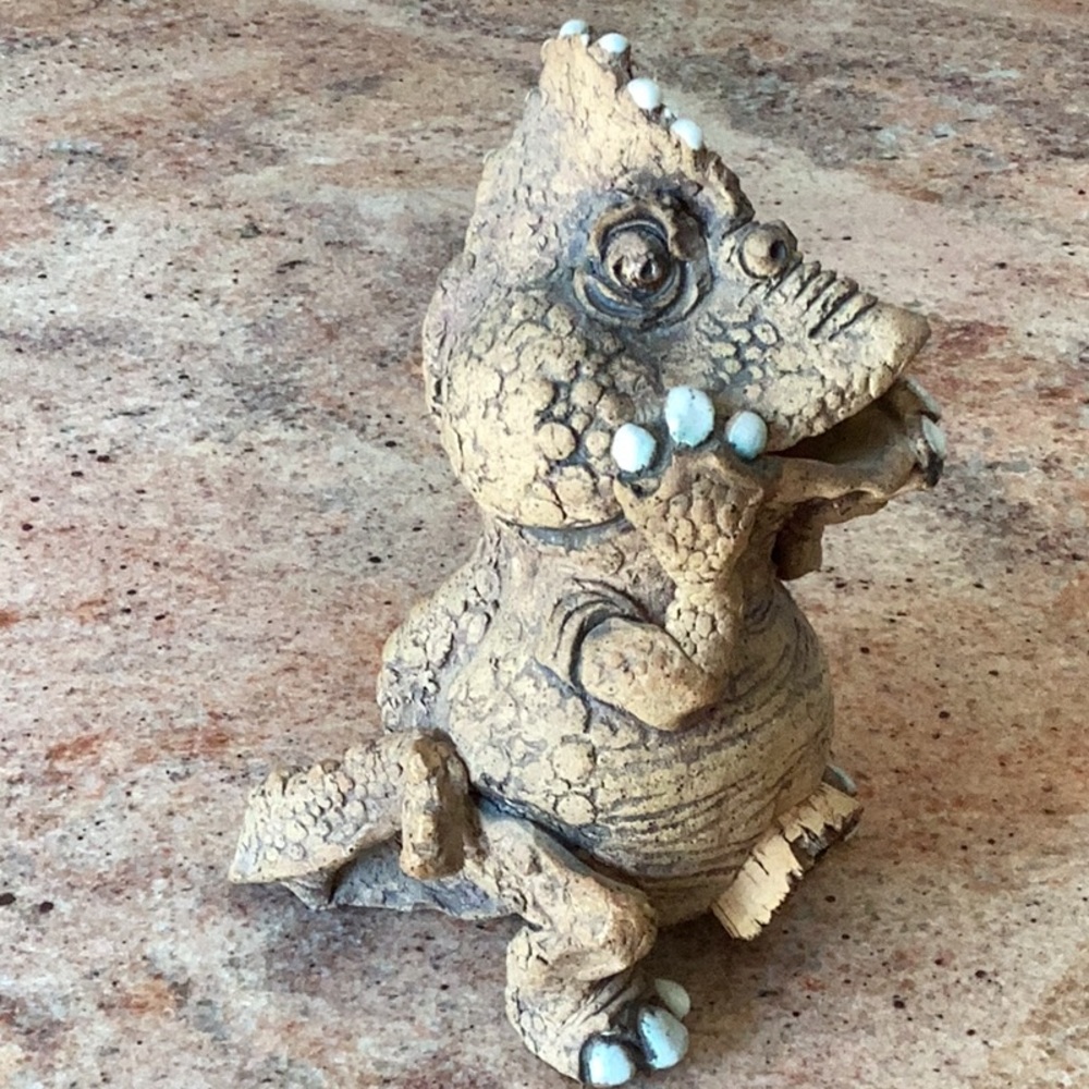 Vintage dinosaur pottery figurine